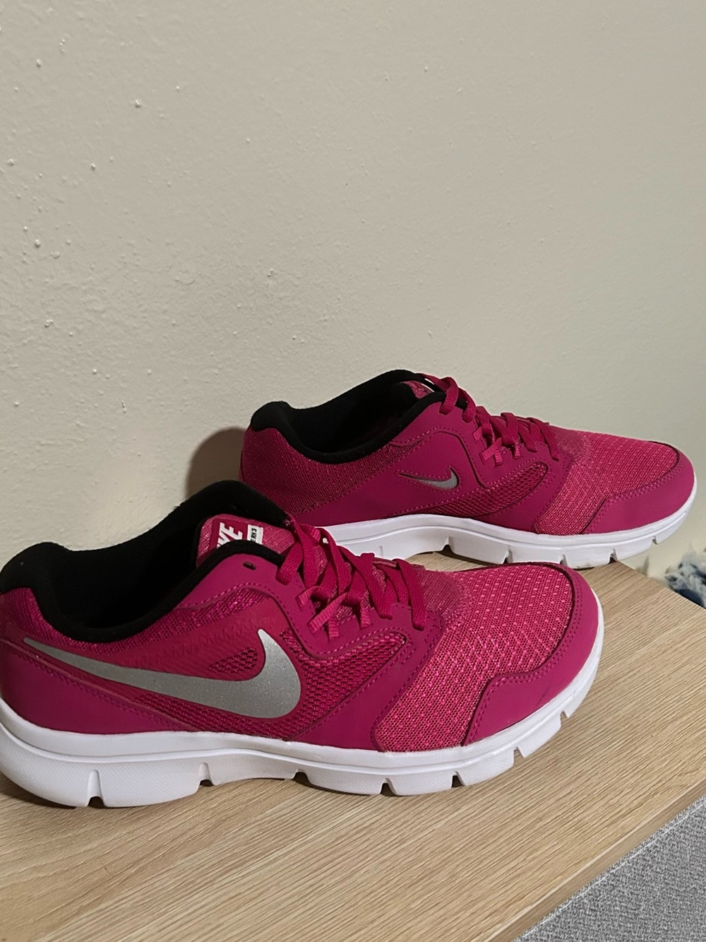 Nike Women's Magenta Athletic Running Shoes with Silver Swoosh